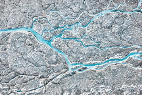 Тающие гренландские узоры в аэроснимках Даниэля Белтра