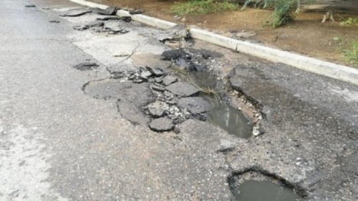 Последствия непогоды: в Кишиневе разрушено около 180 метров асфальта