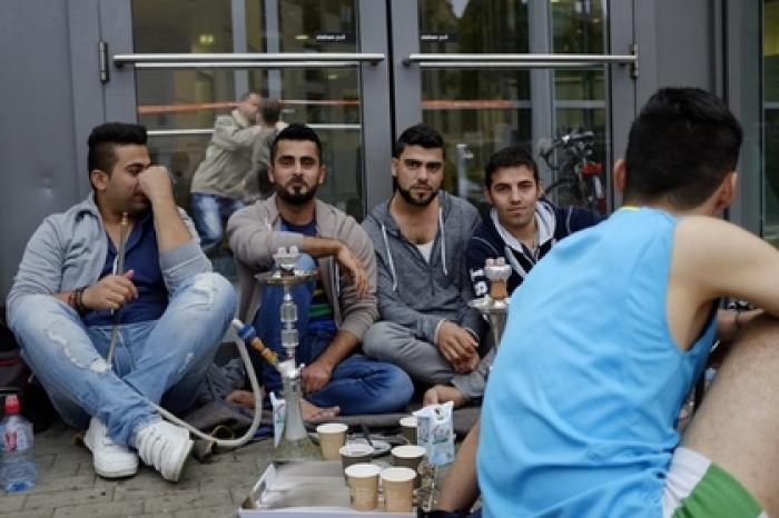 Германия начнет депортировать беженцев за поездки на родину