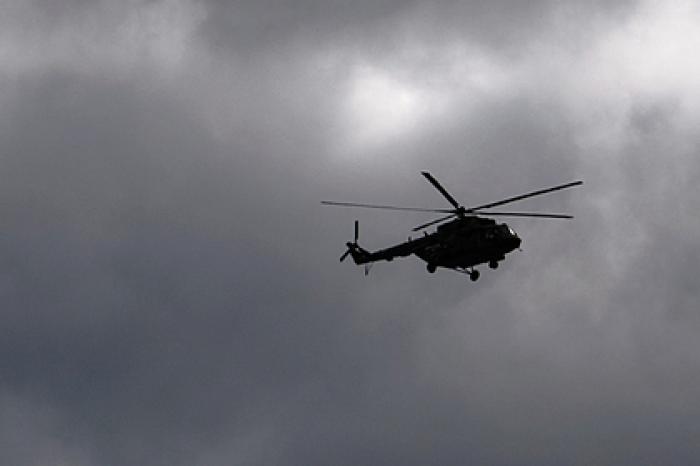 Названа возможная причина падения на бок вертолета Ми-8