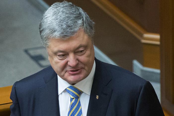 Порошенко обвинили в госизмене за подписание минских соглашений
