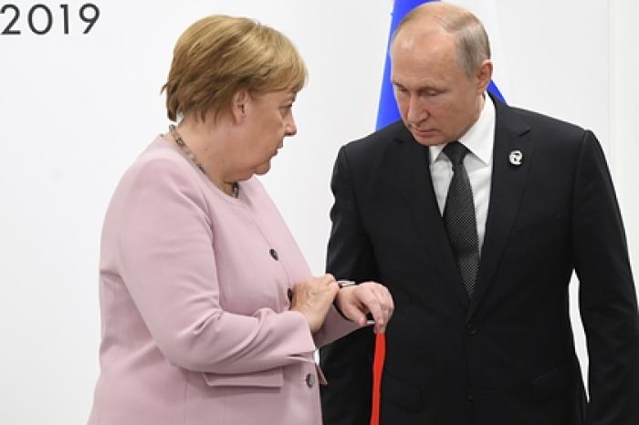 Путин и Меркель поговорили о состоявшемся в Донбассе обмене пленными