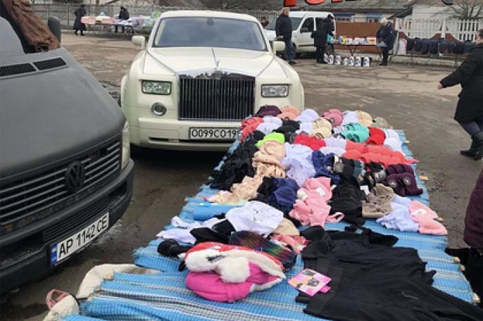 Украинка на Rolls-Royce продавала картошку на рынке