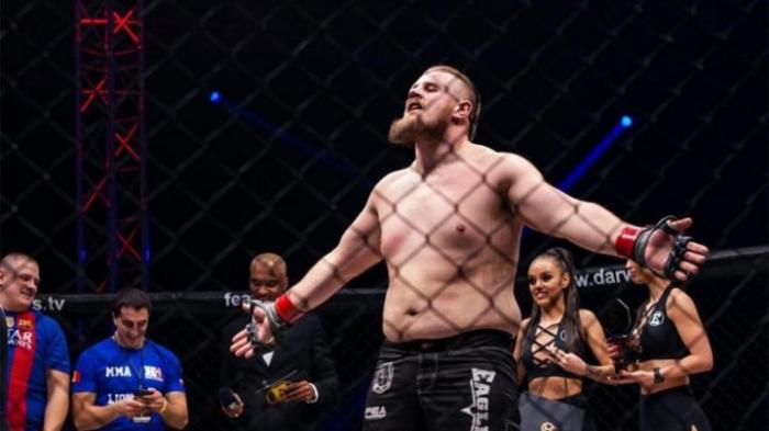 Первый поединок молдавского бойца Александра Романова в UFC перенесен в третий раз