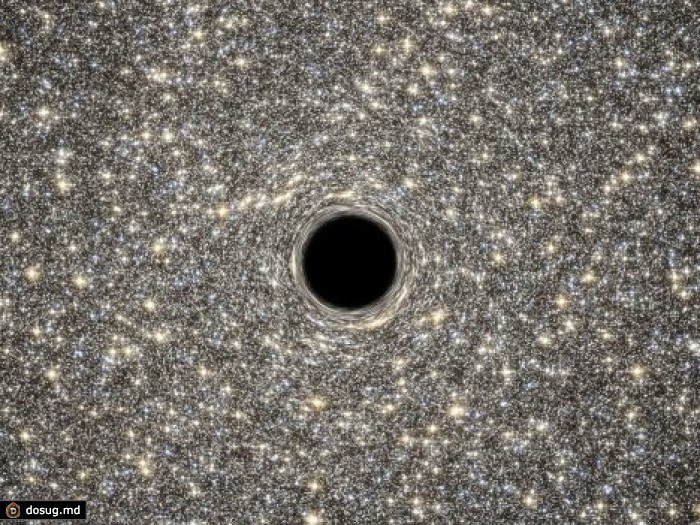 Телескоп Hubble запечатлел на фото огромную черную дыру