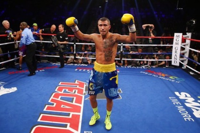 Украинский боксер Ломаченко защитил титул чемпиона мира