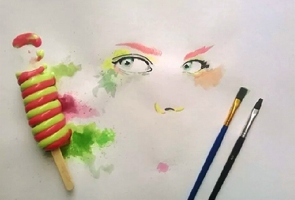 Художник рисует картины, используя мороженое вместо красок