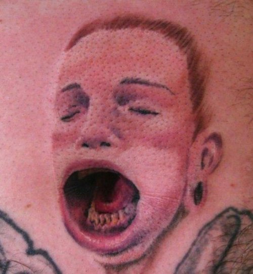 Татуировки возле пупка
