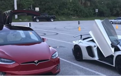 Электромобиль Tesla обогнал спорткар Lamborghini